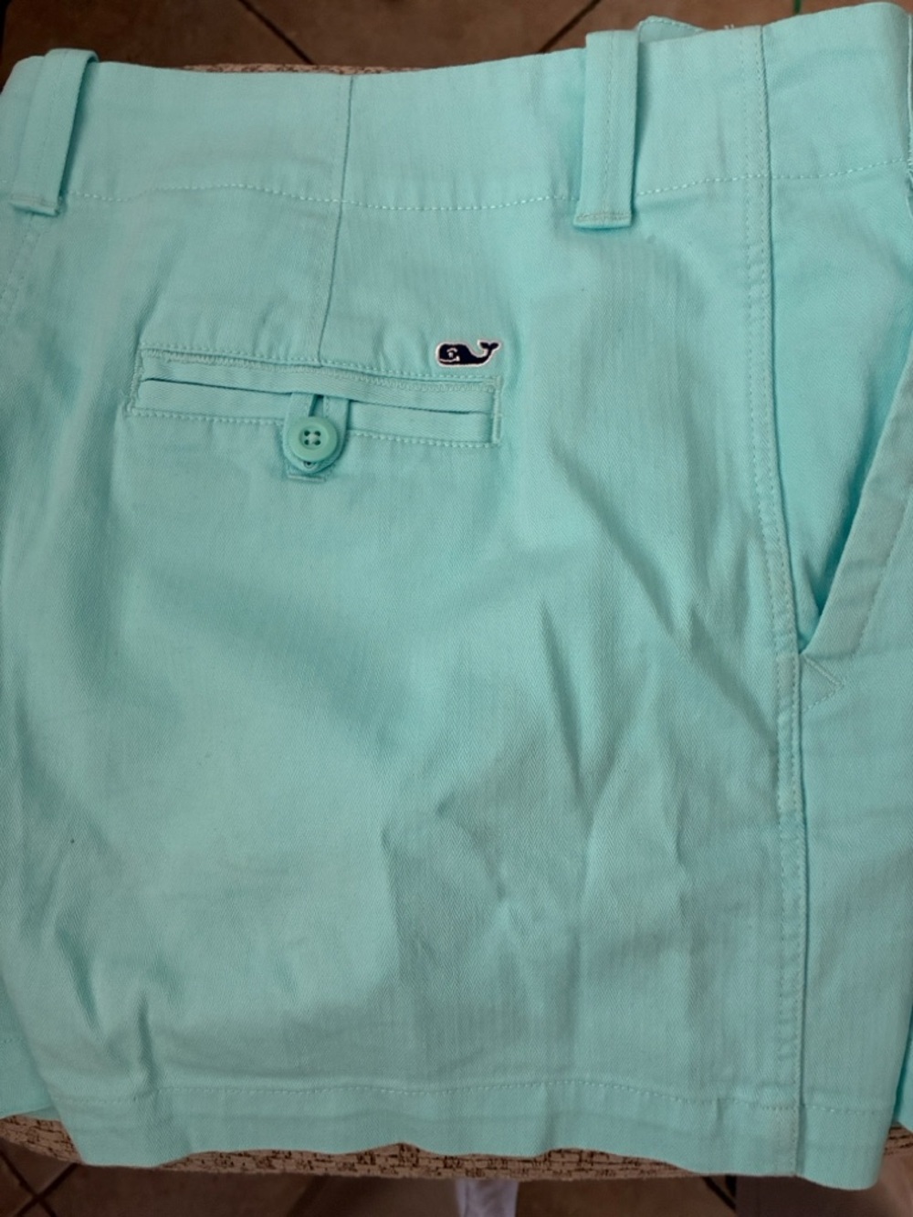 Vineyard Vines women’s Flat-Front Chino Shorts in light turquoise.